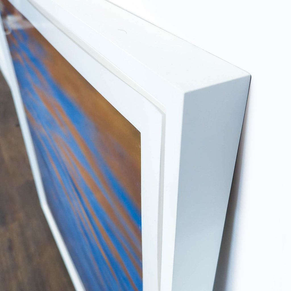 3. Close-up angle of a Reperch water-themed print in a modern white frame, highlighting the frame depth.