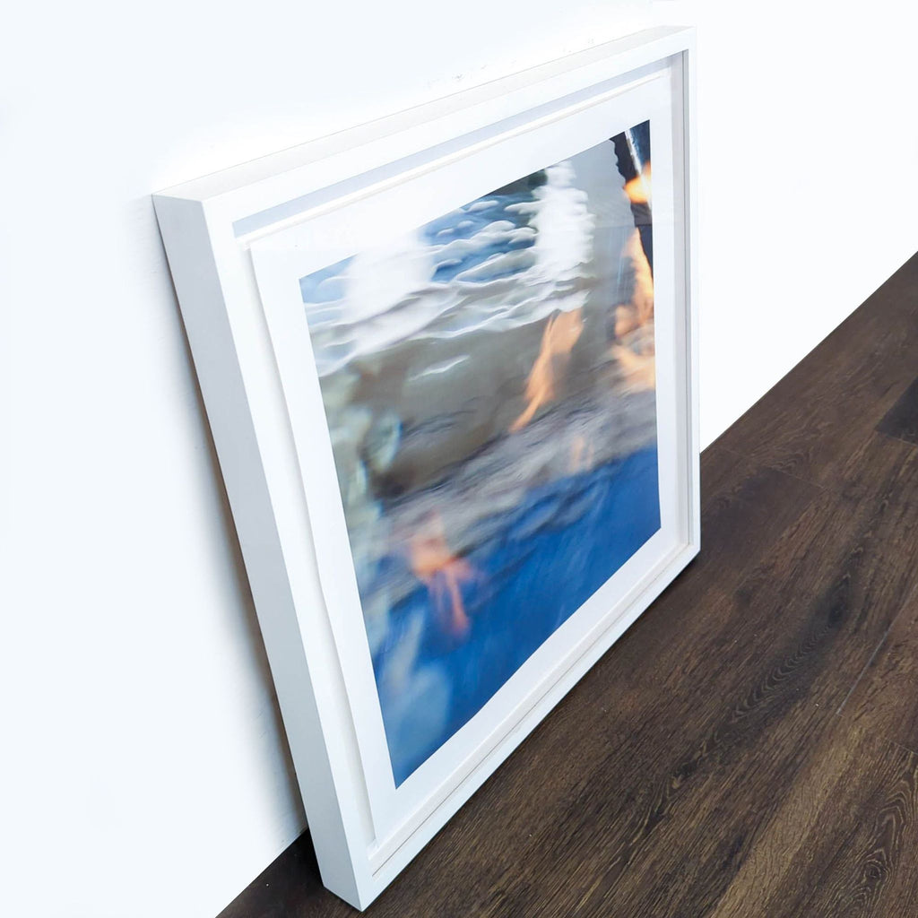 2. Angled view of Reperch abstract framed print, blue/orange hues, from Prints & Maps, size 26¼"x26¼".