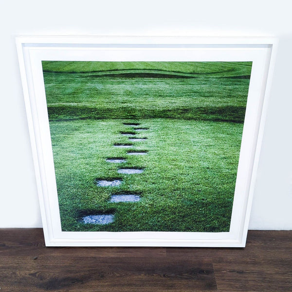 1. Framed Reperch print featuring a path of stone steps across a lush green lawn, viewed from the front.