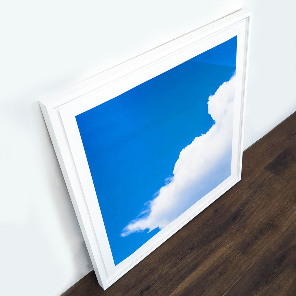 3. Angled view of a large square Reperch framed print of clouds and sky, 42"x42", good condition, Prints & Maps.