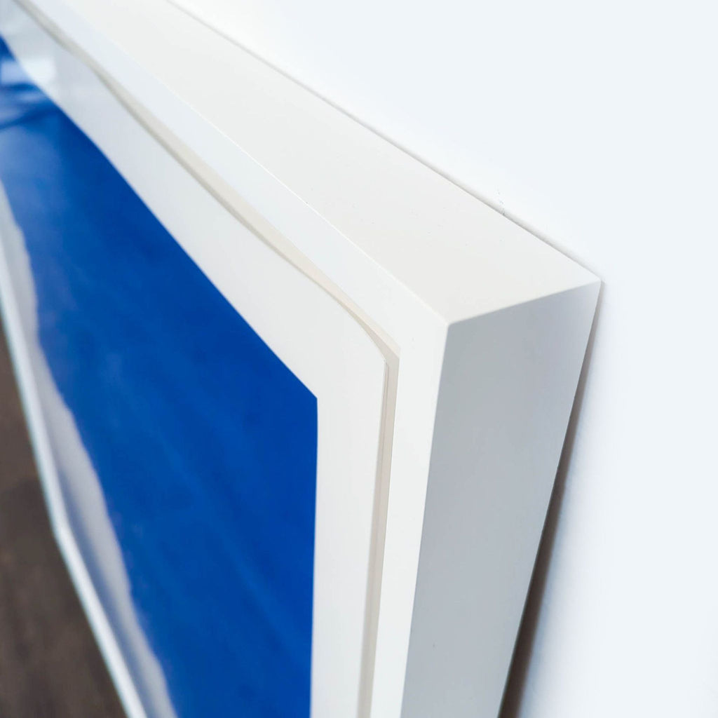 3. Close-up of the white frame edge on a Reperch sky and cloud print from the Prints & Maps category.