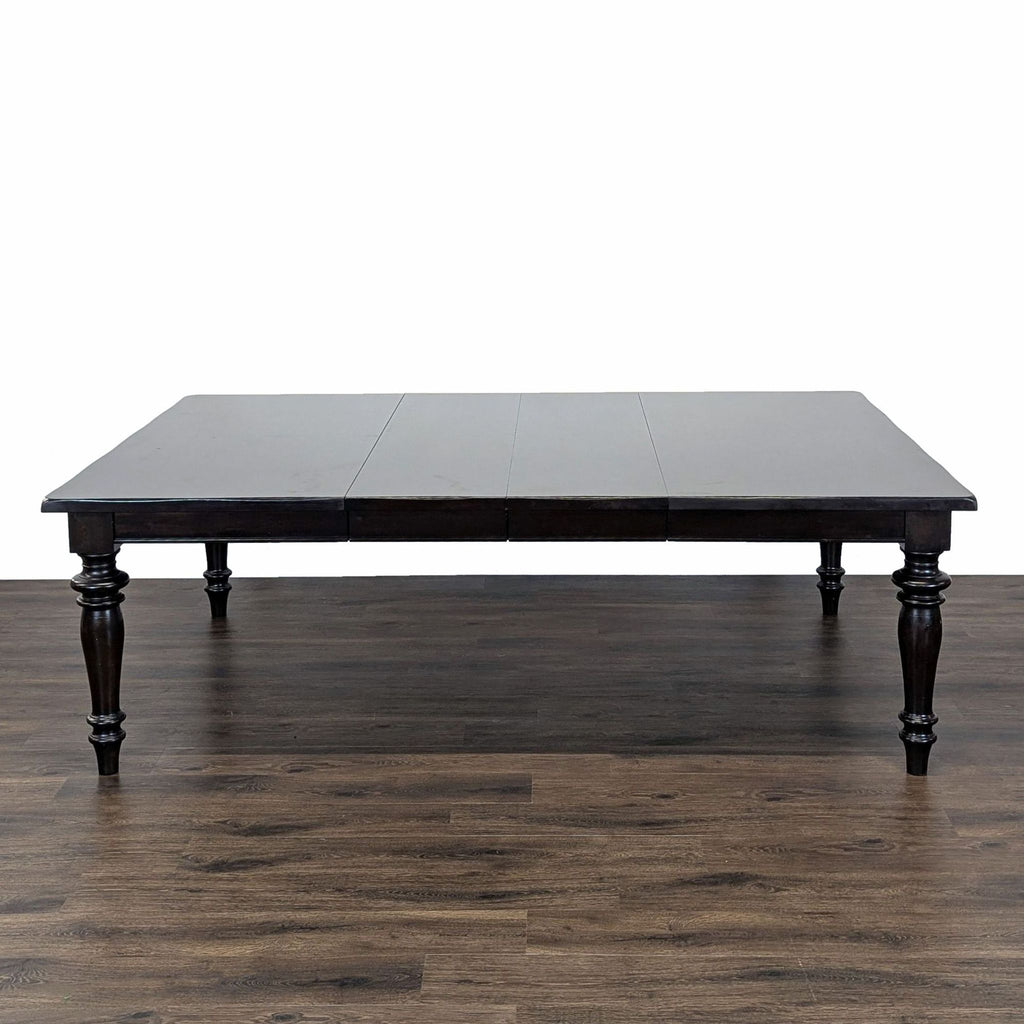 1. Pottery Barn dark wood dining table, shown extended to 92 inches with both leaves installed.