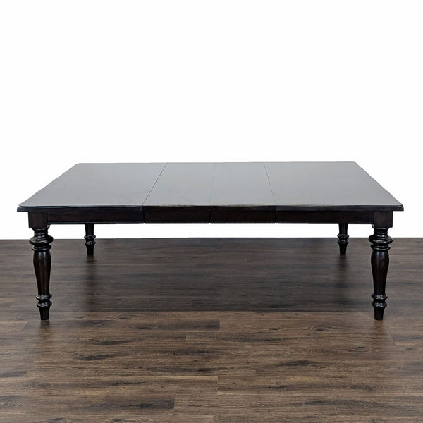 1. Pottery Barn dark wood dining table, shown extended to 92 inches with both leaves installed.