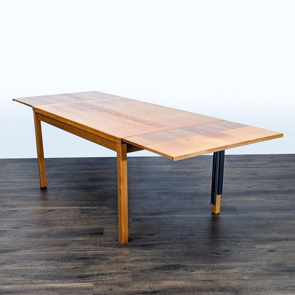 2. Reperch dining table extended to its full length, with leaves pulled out for extra space.  