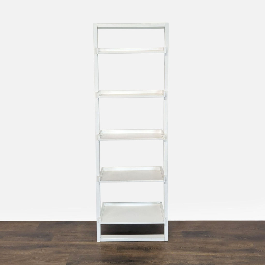 3. Front view of a Reperch branded white bookshelf, featuring five evenly spaced shelves on a wooden floor.