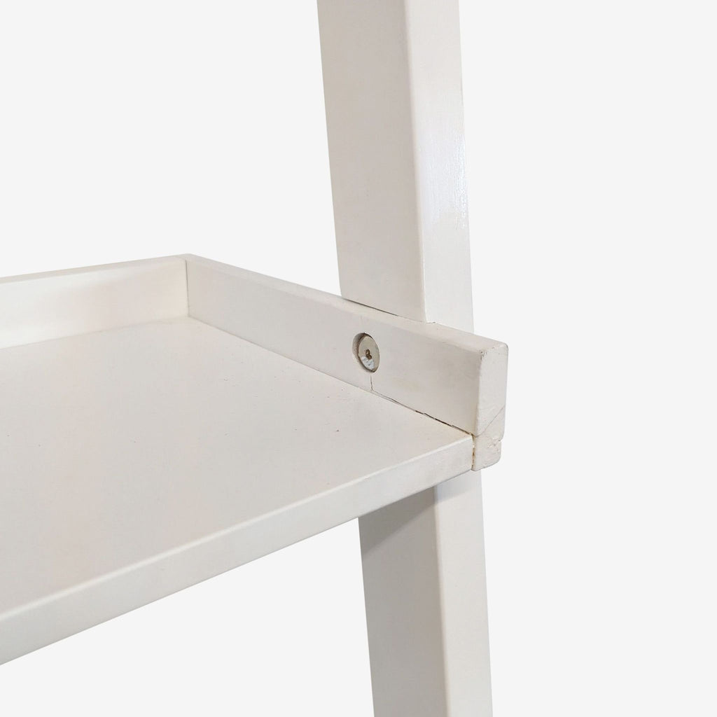 1. Close-up of a white Reperch bookshelf showing a shelf corner with visible screw and joint details.