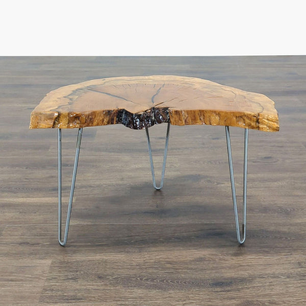 1. Reperch live edge coffee table with natural wood slab top and metal hairpin legs on a wood floor.