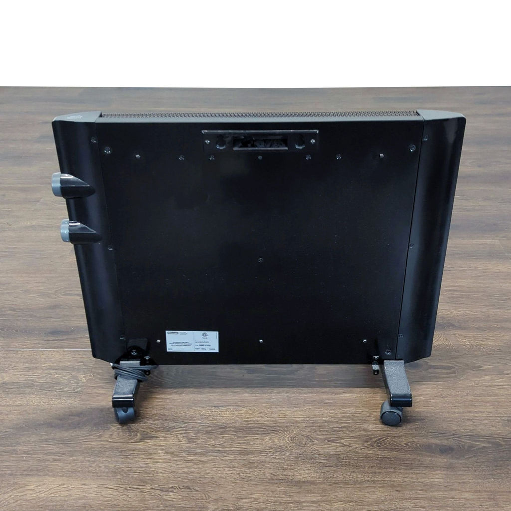 Back view of a compact DeLonghi panel heater, showing smooth rolling wheels and sturdy build for easy placement.