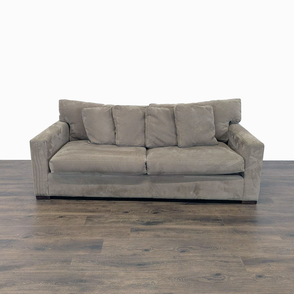Crate and Barrel 3-seat gray sofa features track arms, angled back, and plush feather-down blend cushions, shown head-on.