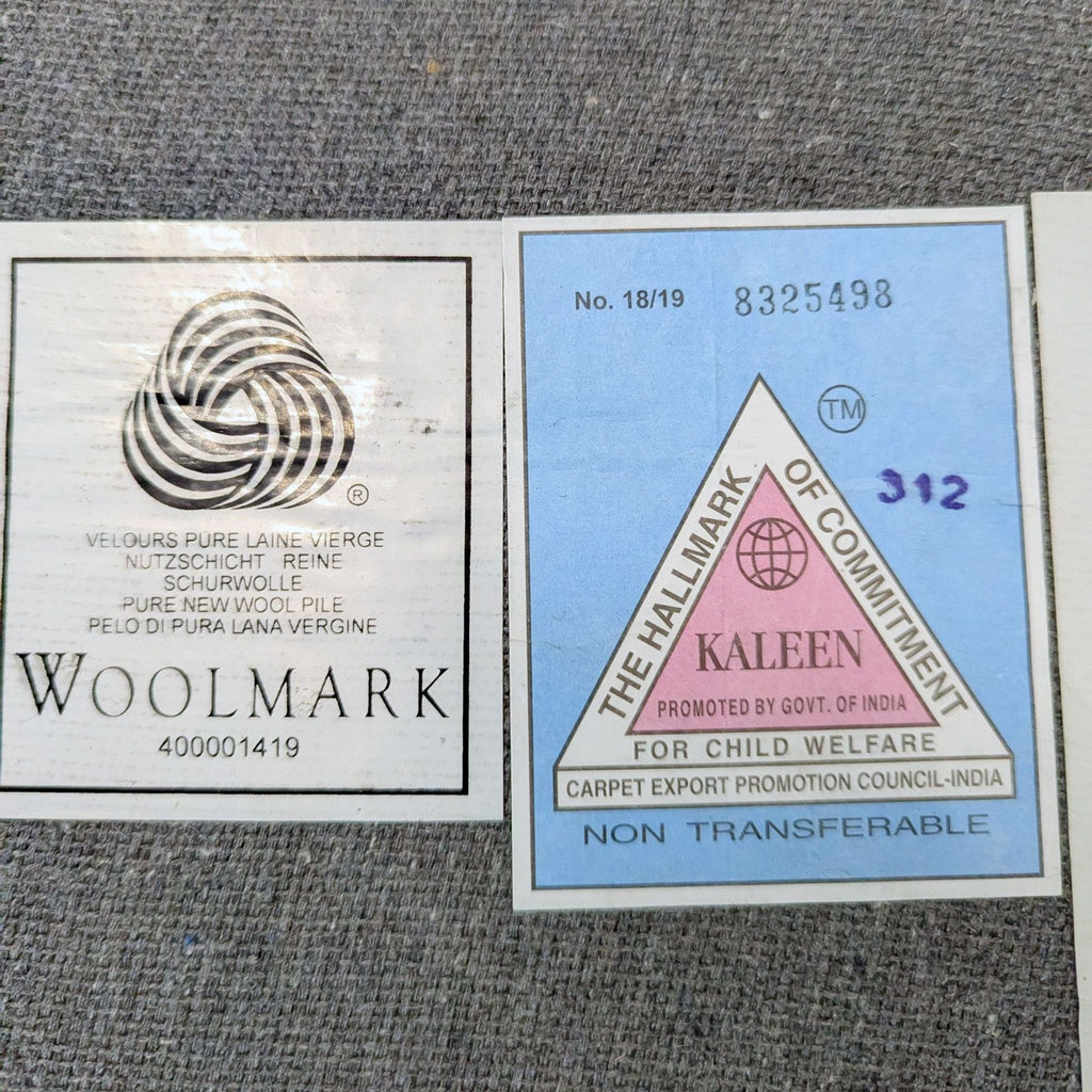3. Woolmark and Kaleen certification labels attached to the back of a Pottery Barn rug.