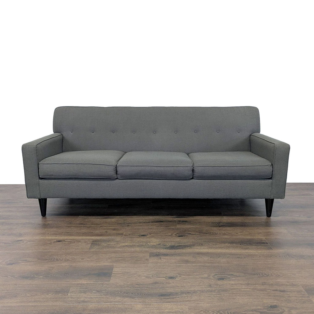 1. Max Home Furniture 3-seat sofa with tapered wood legs, button tufted back, and piped trim, front view.  