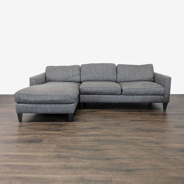 1. Modern Room and Board sectional with track arms, chaise lounge, and tapered wood legs in grey upholstery.