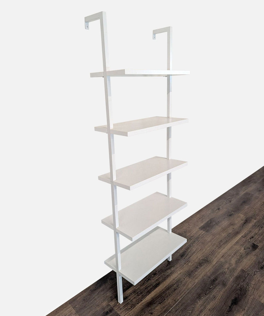 Nathan James wall-mounted bookshelf category, showing five fixed white shelves from a right angle.  