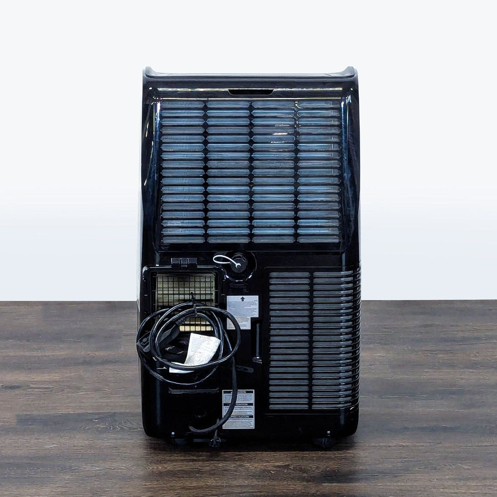 LG Portable Air Conditioner – Sleek Black, Easy-to-Move Cooling Unit