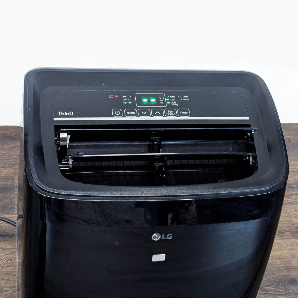 LG Portable Air Conditioner – Sleek Black, Easy-to-Move Cooling Unit