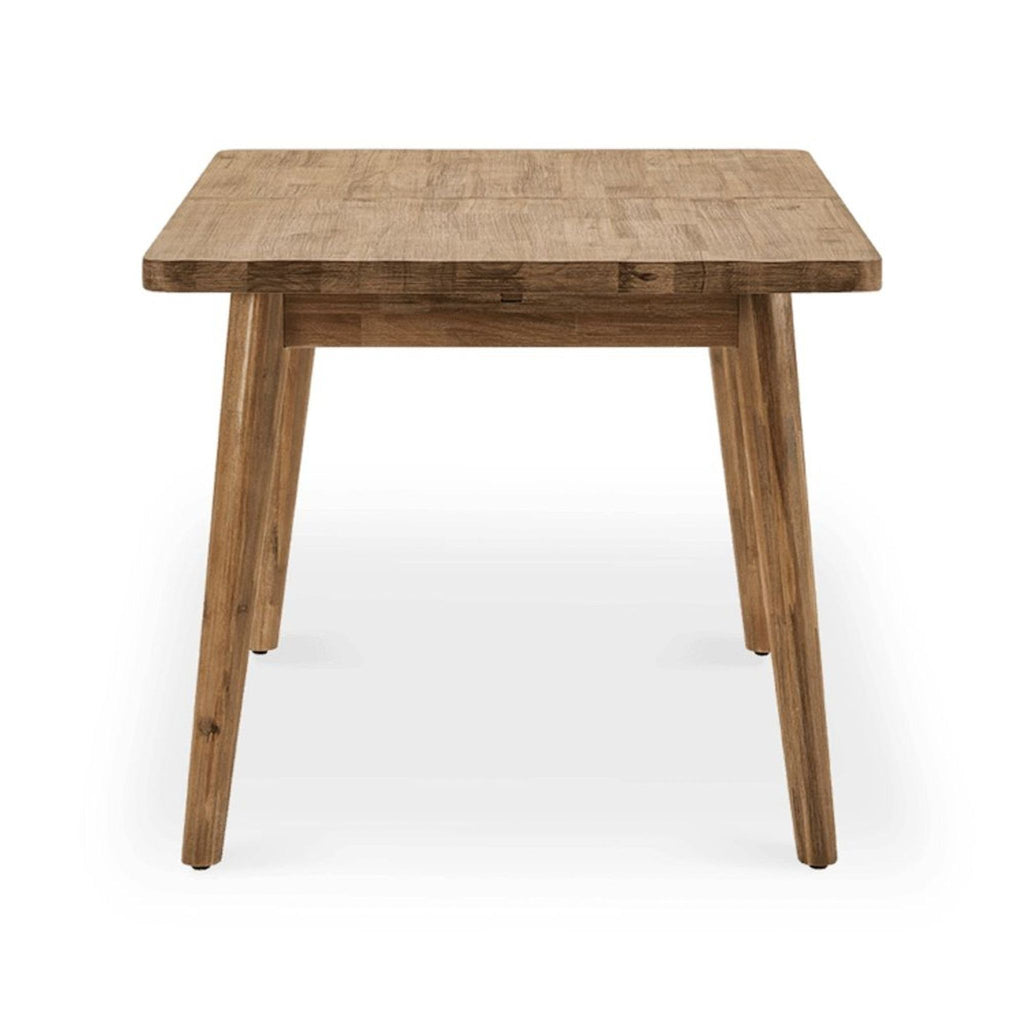 3. Side view of Castlery dining table, solid acacia wood, wire brush finish, simple, rectangular modern design.