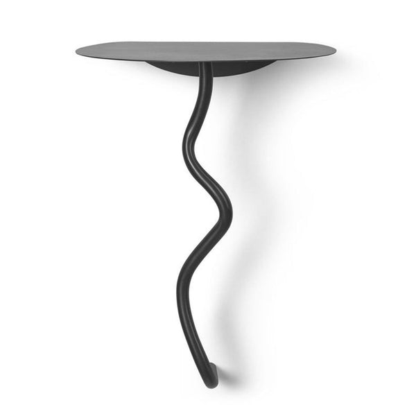 1. Modern black metal wall shelf by Ferm Living with a curved, snake-like support and rounded tabletop design.  