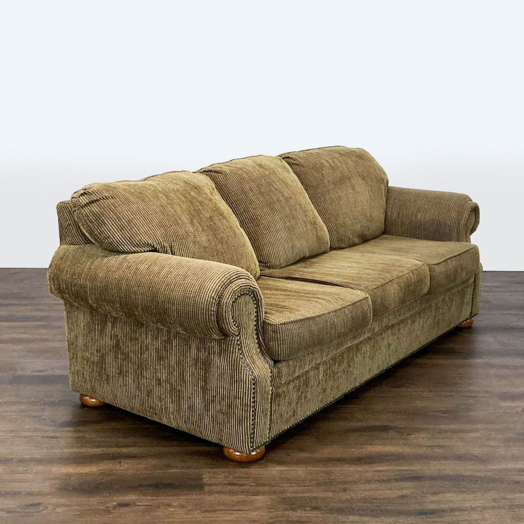 2. Angled view of a Flexsteel 3-seat sofa highlighting plush cushions and curved arm design on wood floor.