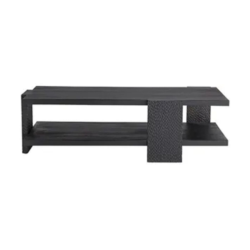 1. Black hand-carved wood coffee table with a wide tabletop, shelf, and textured vertical supports, by Arteriors Home.  