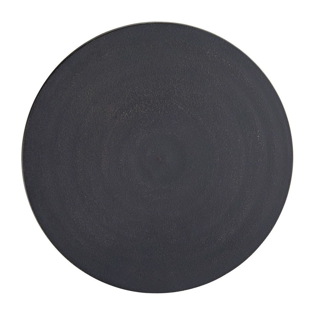 3. Top view of a circular charcoal side table by Arteriors Home, showcasing a smooth, minimalist design.