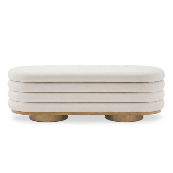 1. Channel-tufted boucle bench ottoman by Castlery with rounded edges and wooden base, front view.