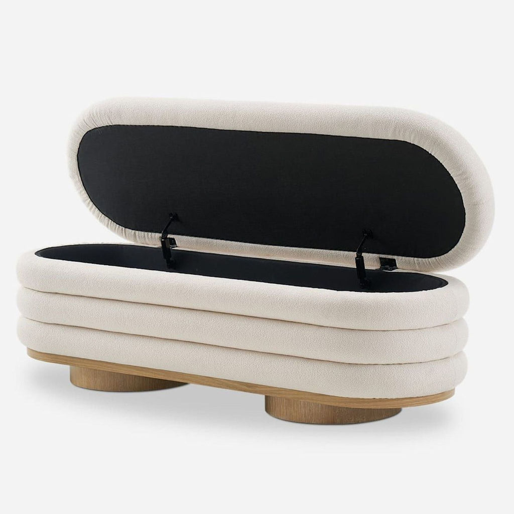 2. Castlery channel-tufted boucle ottoman featuring open storage compartment and sturdy wooden legs.