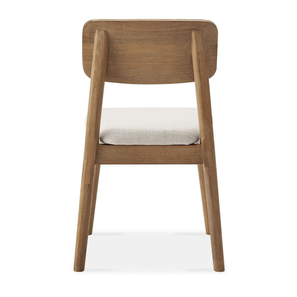 Back view of Castlery solid acacia wood dining chair with padded, upholstered performance fabric seat.