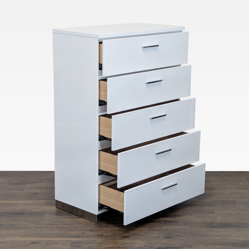 2. Angled view showing all five drawers partially open on the white Coaster dresser, revealing spacious storage.