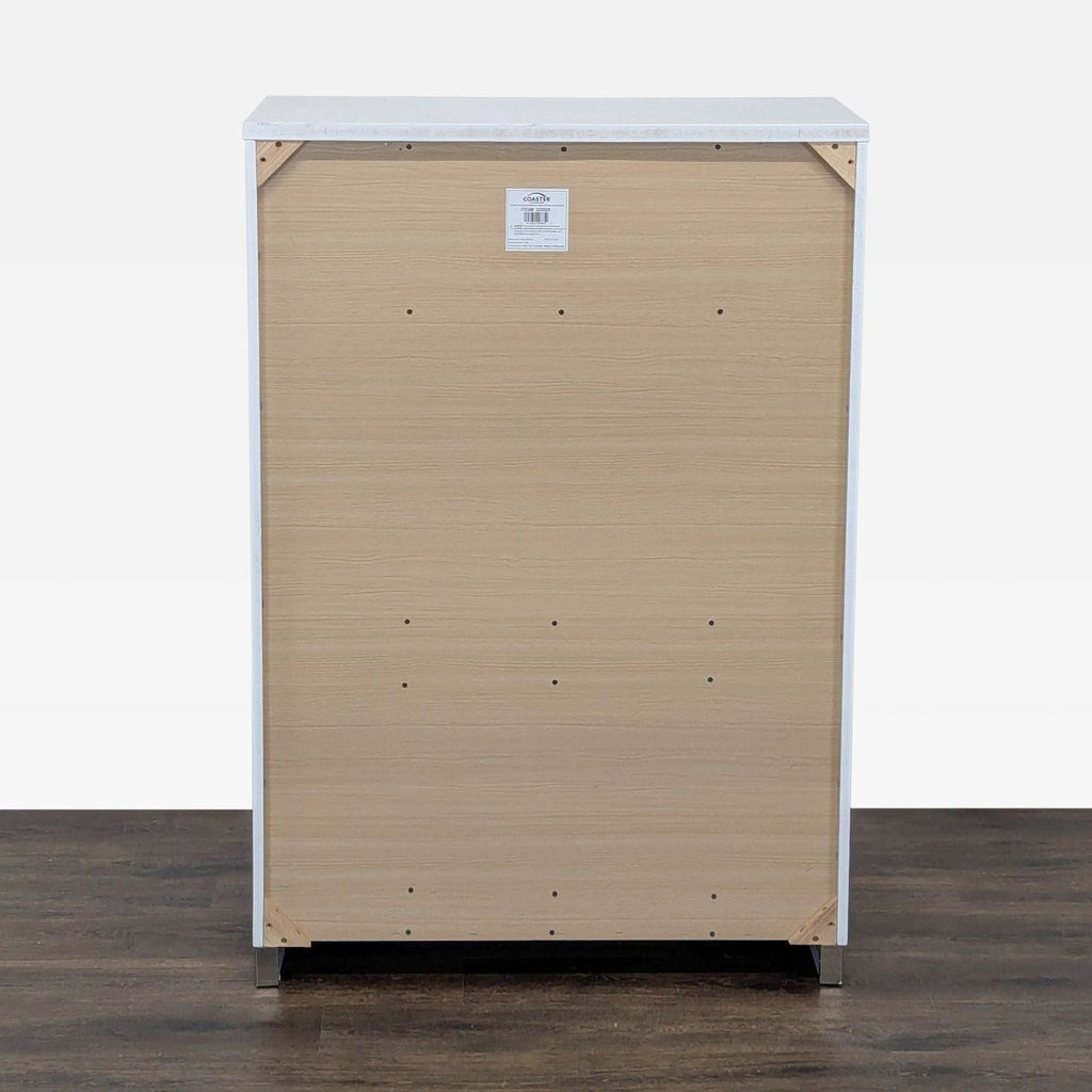 3. Rear view of the Coaster brand white dresser, displaying its sturdy light wood backing and construction details.