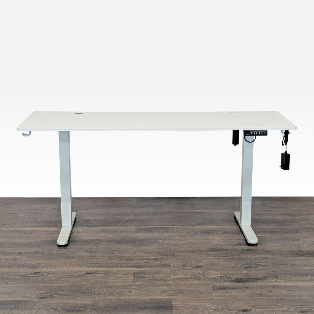 1. Modern Hengjian Home Furnishings desk with electric height adjustment, spacious tabletop, and built-in organization hooks.  