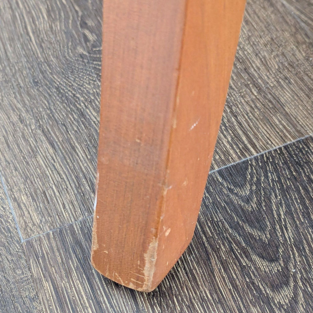 Circular table with two leaves to make two different sized ovals. 2 armed host chairs and 5 other chairs. Also 1 damaged chair which could be repaired. 
One leaf is installed. 
View of legs and base. 
Showing leaf mechanism. 
Side chair and host chai