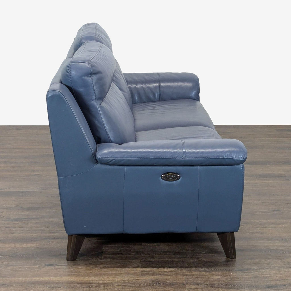 Couch is electric and each side reclines with button on sides to almost flat.
7ft x 3 ft