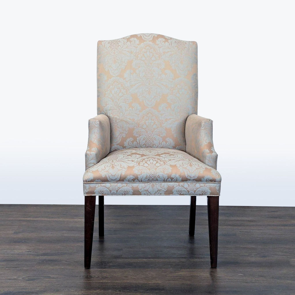 1. Elegant Mitchell Gold + Bob Williams armchair with floral damask upholstery, viewed from the front.