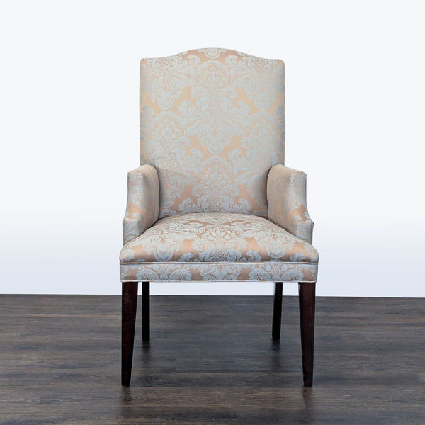 1. Elegant Mitchell Gold + Bob Williams armchair with floral damask upholstery, viewed from the front.