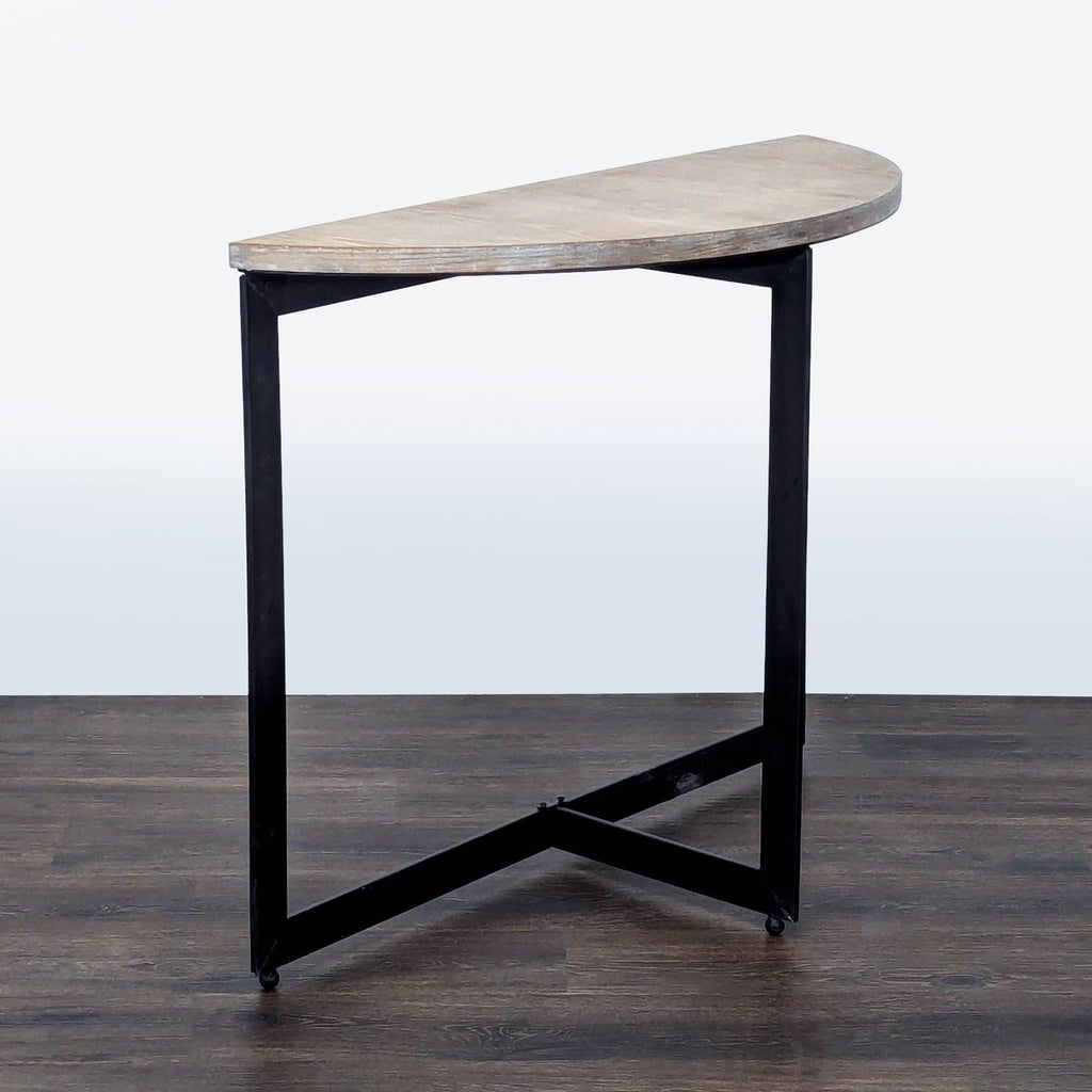 2. Contemporary console table by Mercana with a semi-circular wooden surface and geometric black legs, side view.  