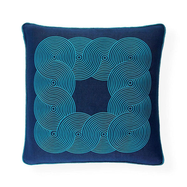 Front view: Square navy linen pillow by Jonathan Adler, with raised blue satin stitch pattern and corded edge.  