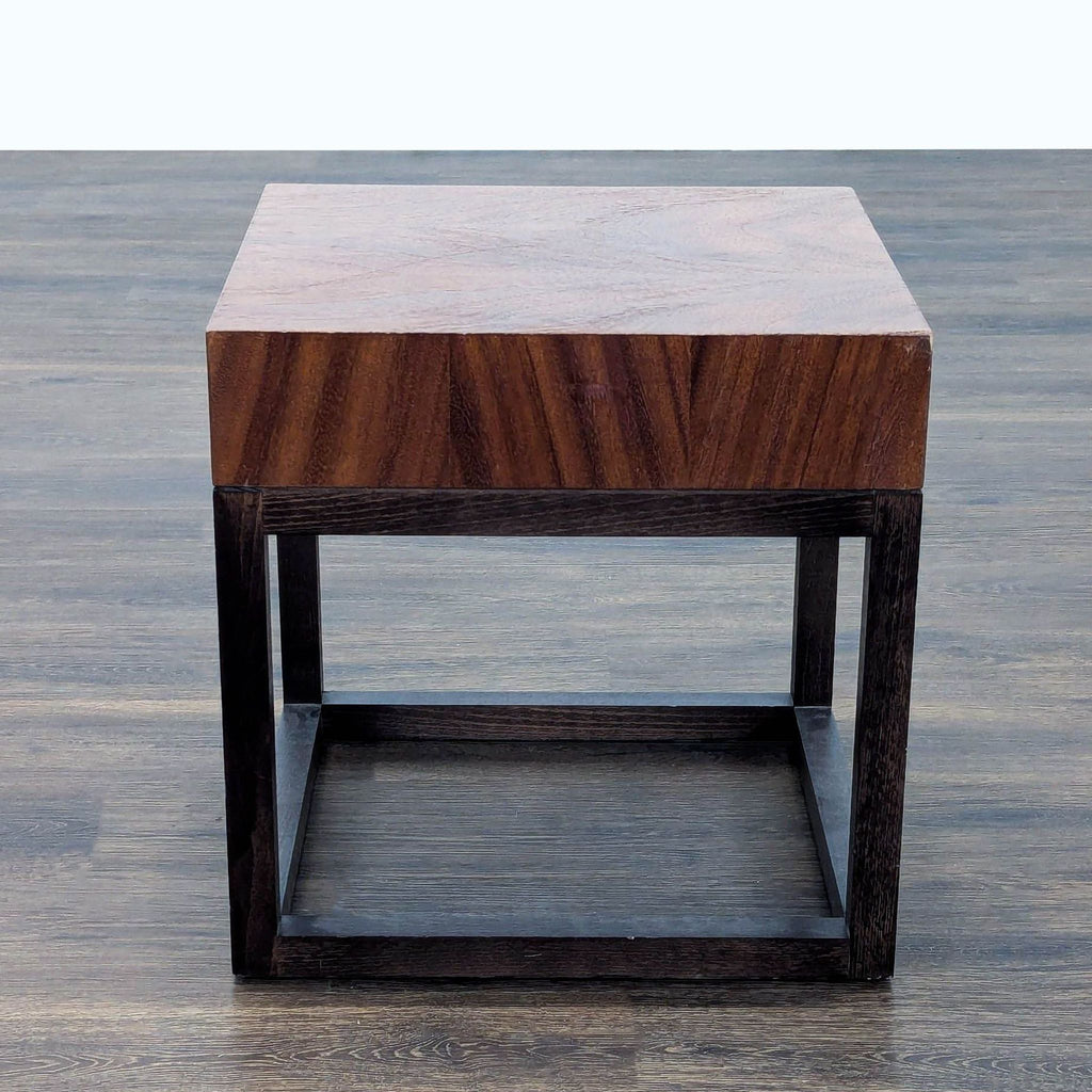 2. Modern square end table by Crate & Barrel featuring a solid wood top and minimalist open base design.