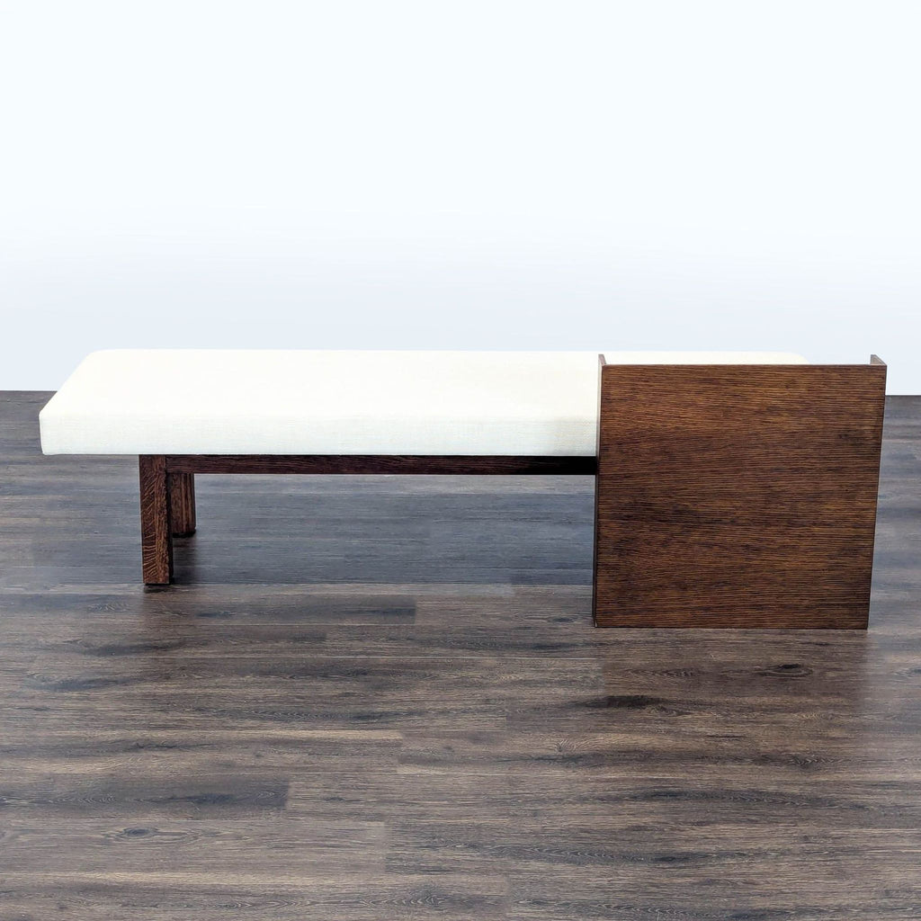 - Contemporary Reperch bench with integrated side table, cream upholstery, and rich wood details.