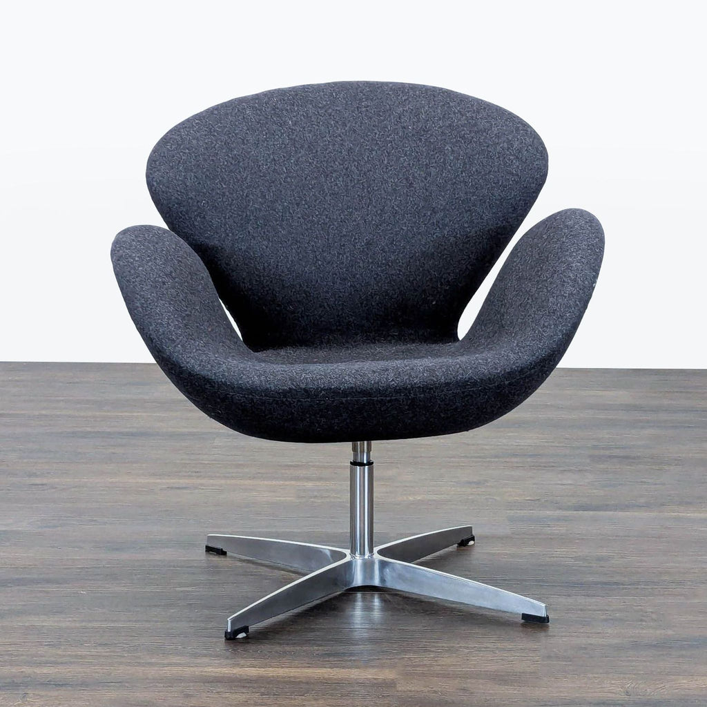 1. Front view of a modern Reperch lounge chair with curved dark upholstery and metal base on wood floor.