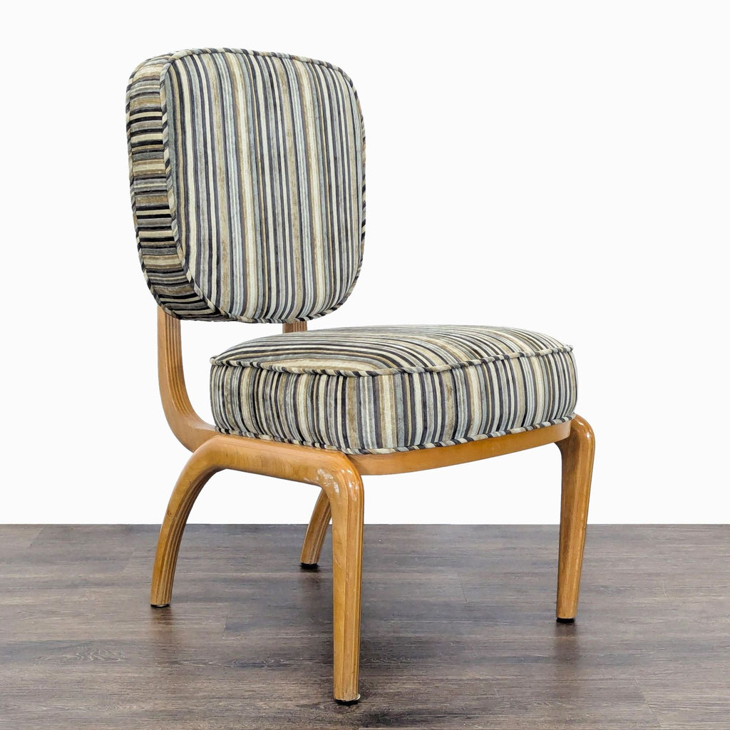 Angled view of Reperch dining set chair with plush striped cushions and bent wood frame.