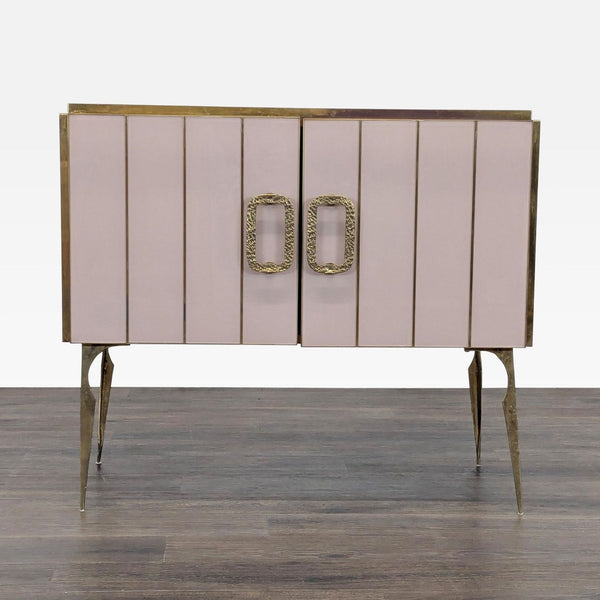 Front view of a handmade 1980s Reperch sideboard with pink Murano glass, gilt brass borders, and handles.  