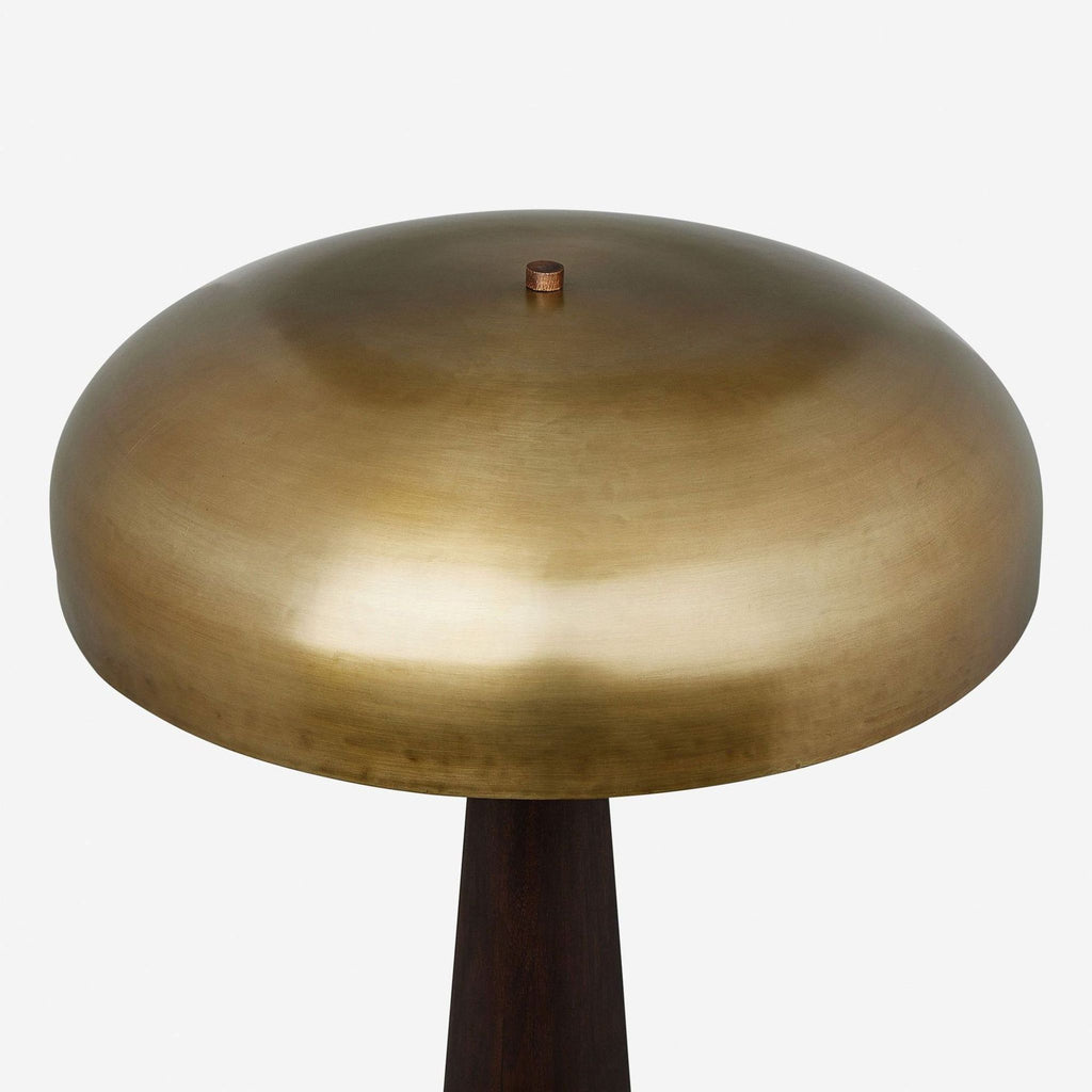 1. Close-up of a Lulu and Georgia lamp showing a wide, brushed brass dome-shaped shade.