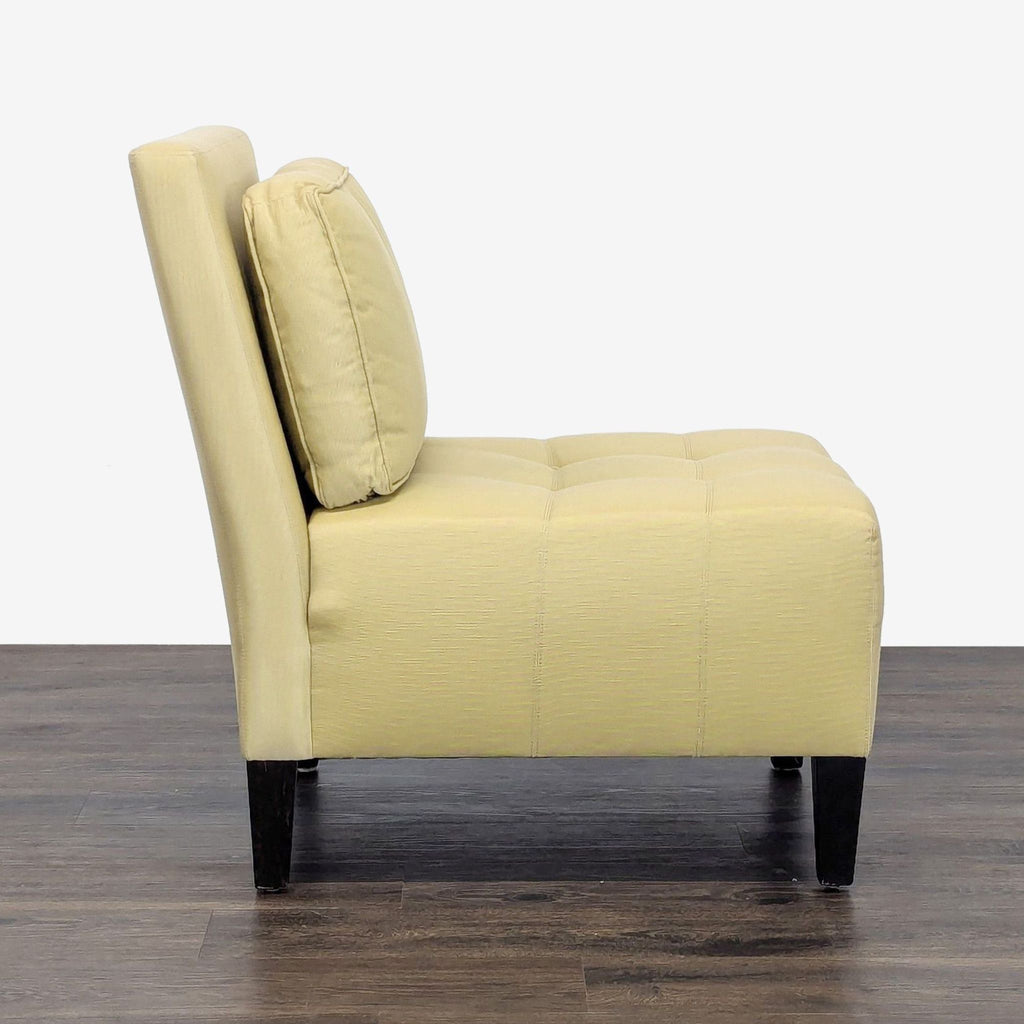 Side profile of a fabric-upholstered Reperch lounge chair, showing plush cushioning and solid wood legs.