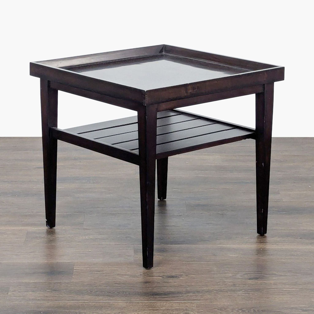 1. Reperch dark wood end table with square top, lower slatted shelf, and tapered legs on a wood floor.