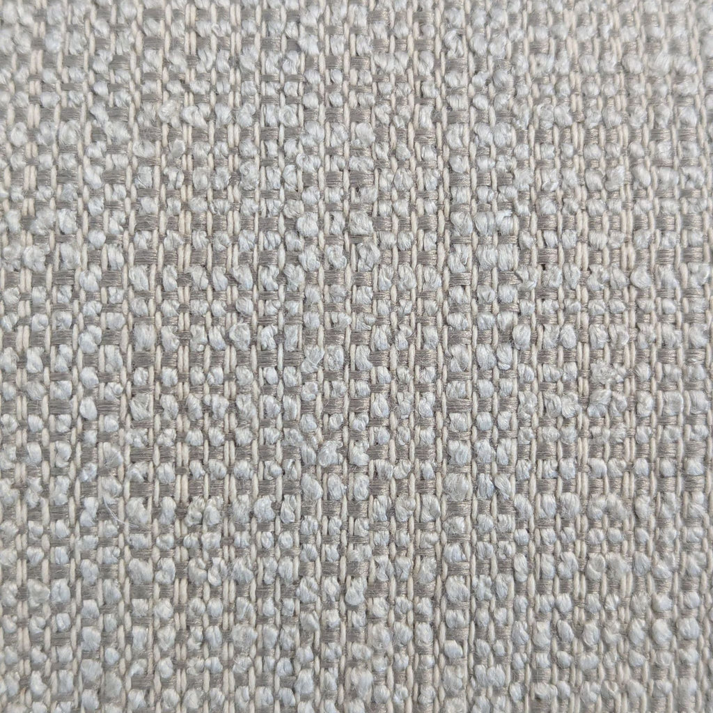3. Macro shot of the Shenandoah Furniture loveseat’s light, woven fabric upholstery texture.