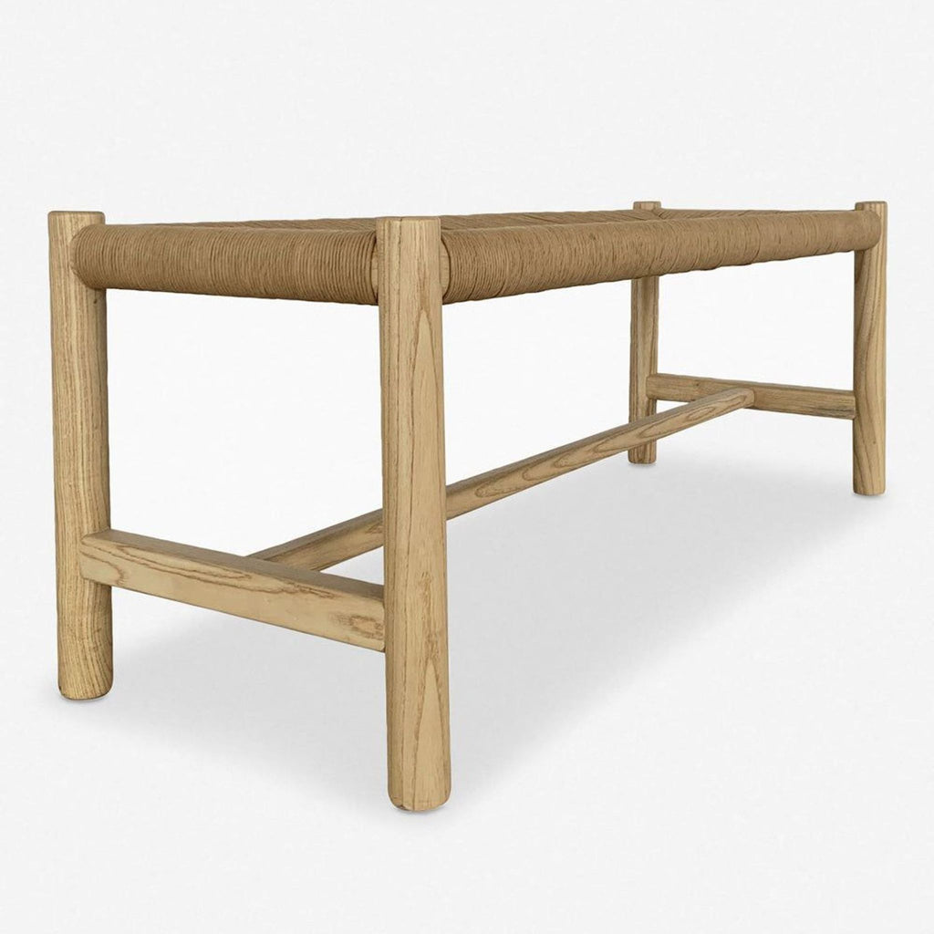 2. Angled view of a Lulu and Georgia bench, showing the woven rope top and sturdy light wood legs.  