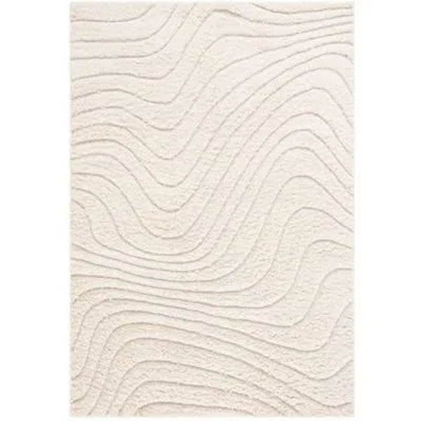 1. Cream-colored Havenly rug with a raised modern wave pattern and soft texture, viewed from above.