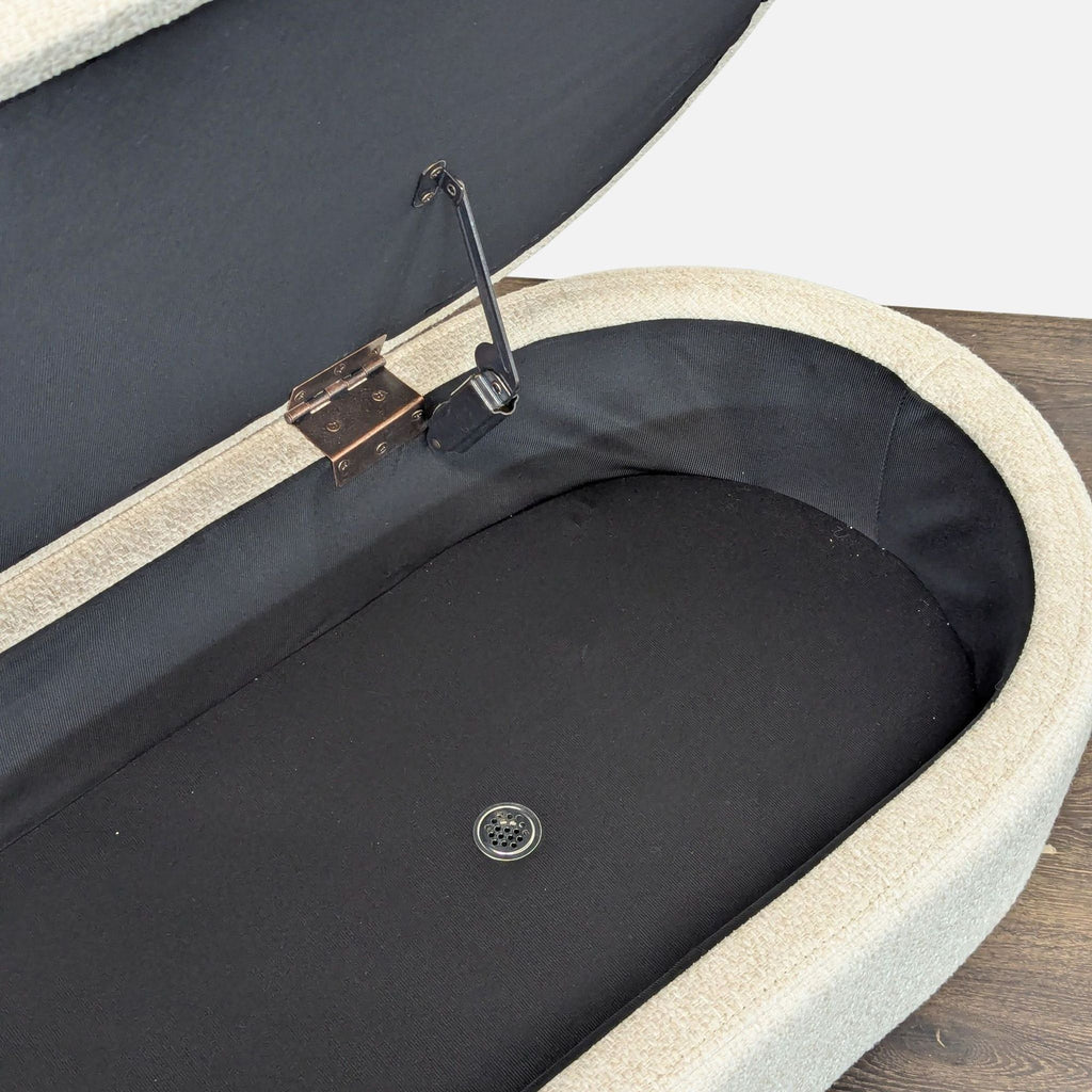 3. Close-up of storage ottoman's interior, displaying hinged lid mechanism and fabric-lined compartment, Walmart brand.