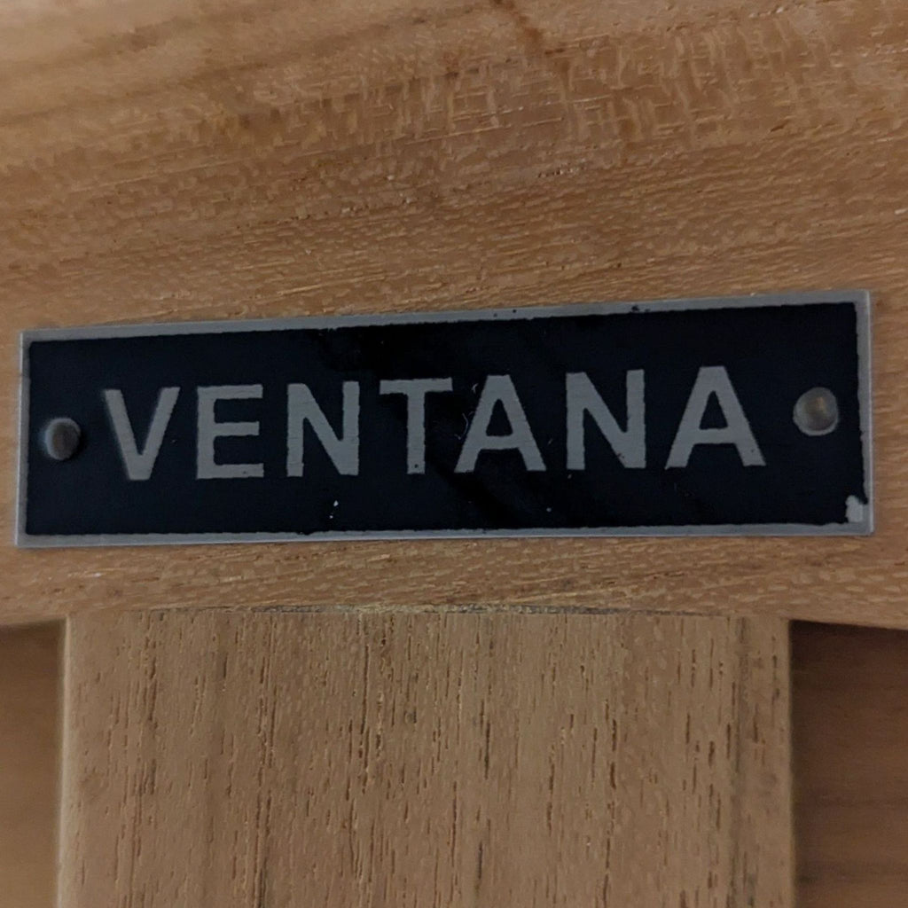 2. Brand label reading "Ventana" attached to the natural wood frame of a side table.  