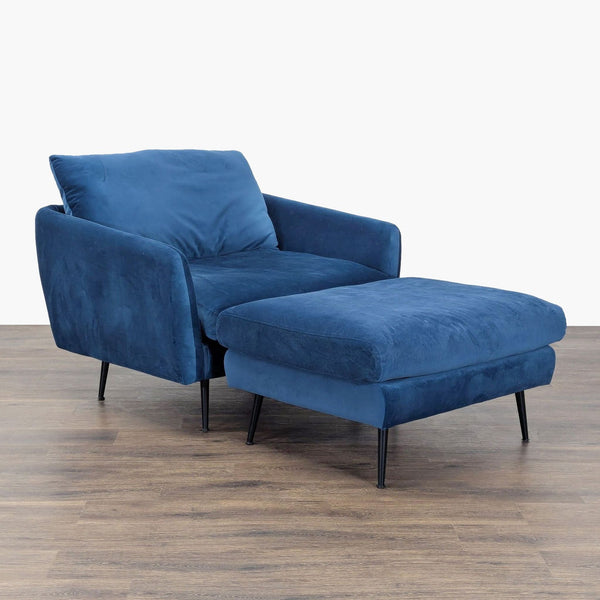 1. Edloe Finch lounge chair and ottoman set in soft blue velvet with modern black legs on a wood floor.  